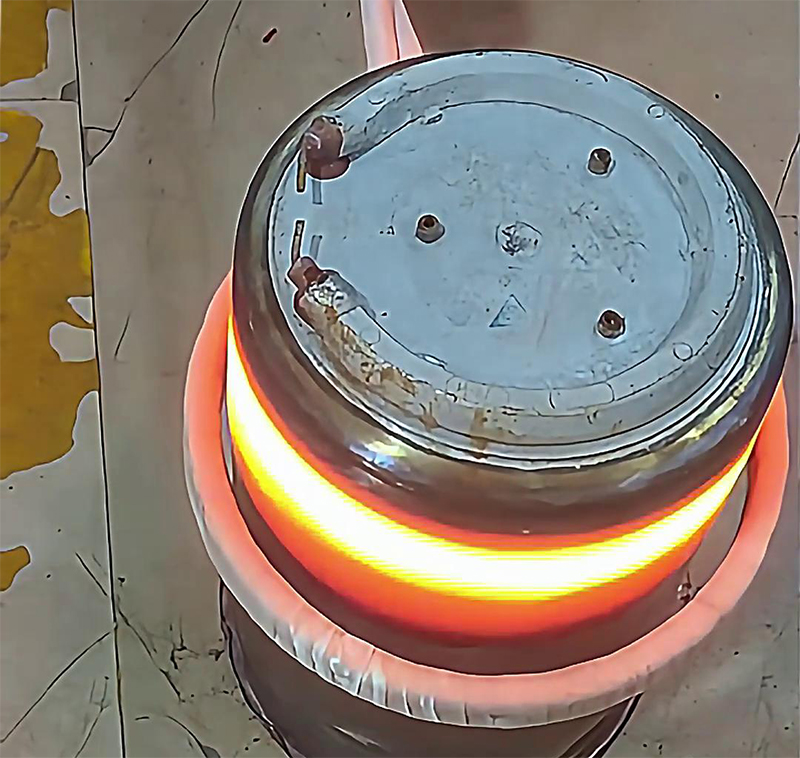 不锈钢烧水罐体毛坯的退火处理，采用手持式高频加热机进行自动化在线退火生产(图1)